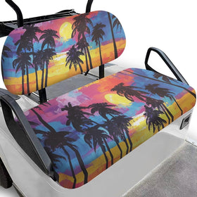 Darisoco Sun Palm pattern seat cover on a two-seat golf cart, stylish protection.