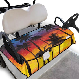 Darisoco Sunset Palm seat cover protects golf cart seats with a vibrant tropical pattern.