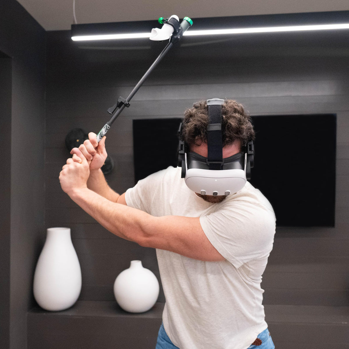 Player using Snaptic Module during gameplay for immersive feedback in VR golf.