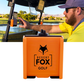 DESERT FOX GOLF Phone Caddy securely grips a smartphone on a golf cart.