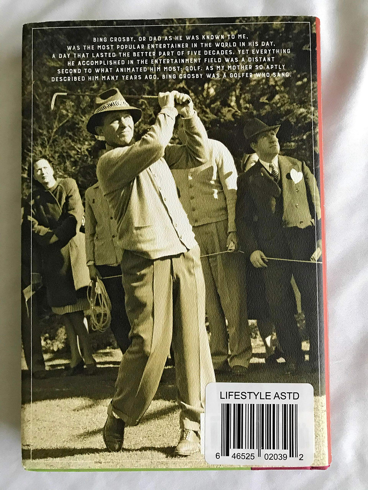 Dey Street Books 18 Holes with Bing interior pages, showcasing father-son golf stories and lessons.