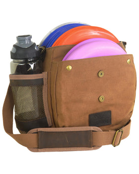 Disc Living original disc golf bag with waxed canvas and quick-access discs.