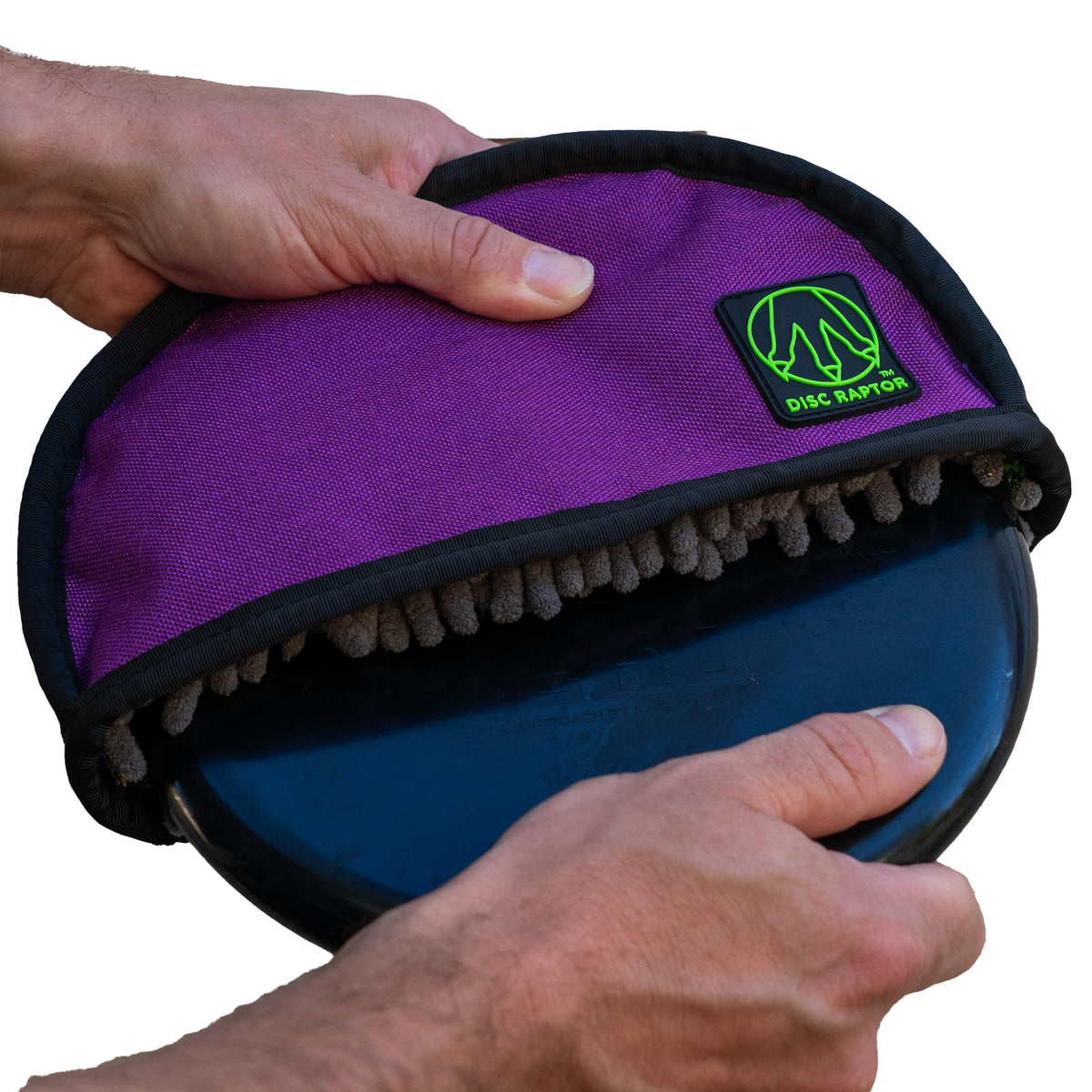 Disc Raptor amethyst-gray cleaning tool with microfiber interior for quick, thorough disc cleanup.