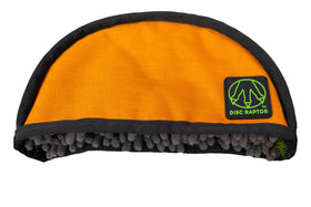 Disc Raptor turf spine scrubs dirt from discs on the go.