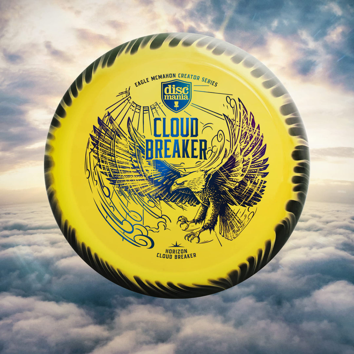 Discmania Eagle McMahon Cloud Breaker in-hand on a fairway demonstrates control-ready design