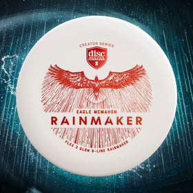 Discmania Eagle McMahon Rainmaker Glow sits ready for precise short-range putts.