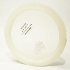 Discmania Glow Active Astronaut disc ready for tailwind distance throws at night.