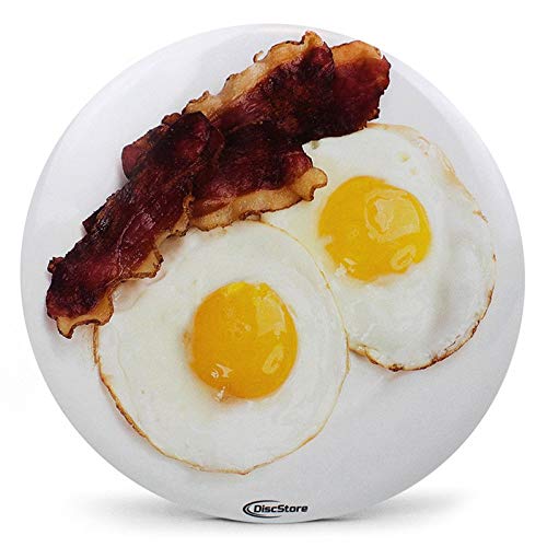 Discraft Buzzz Bacon Eggs hero shot shows bold artwork for midrange play.