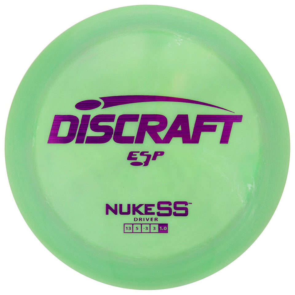 Discraft Nuke SS distance driver in flight for long, controlled throws.