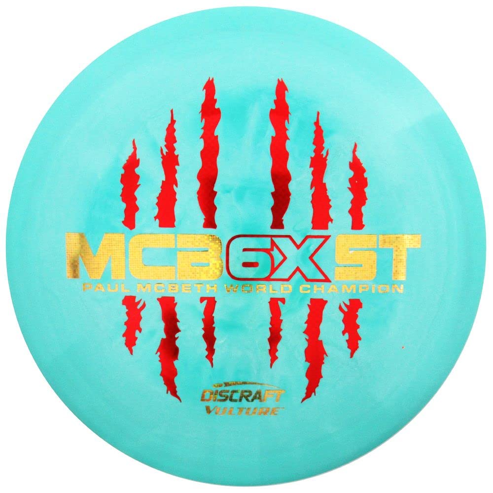 Discraft Paul McBeth 6X Vulture distance driver in flight, emphasizing controlled long-range placement.