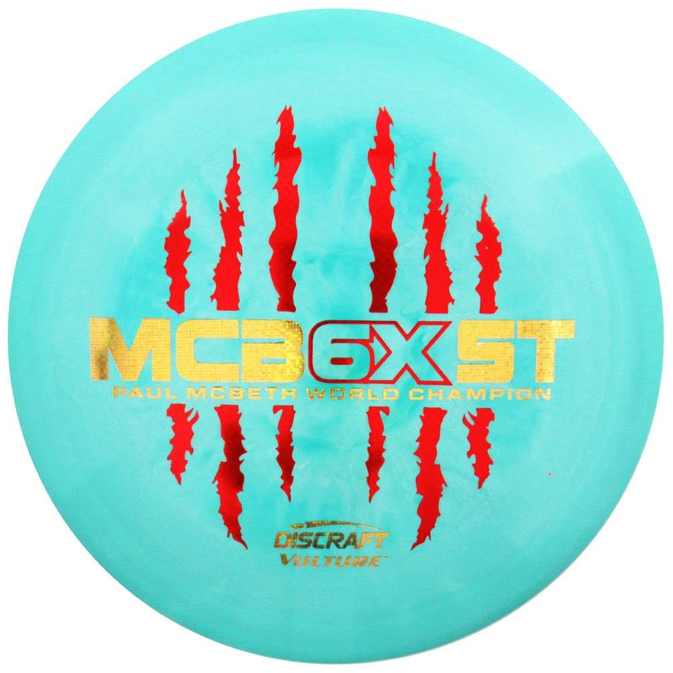 Discraft Paul McBeth 6X Vulture distance driver in flight, emphasizing controlled long-range placement.