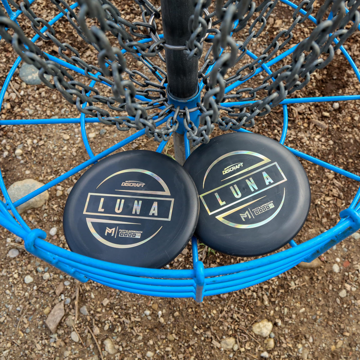 Discraft Luna putter pack navigation through woods demonstrating accuracy