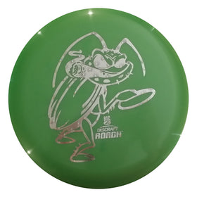 Discraft Roach in-flight over park shows straight glide toward chains.