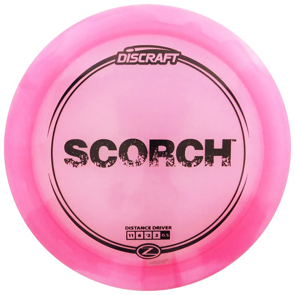 Discraft Scorch distance driver in flight with smooth glide and dependable fade for distance.