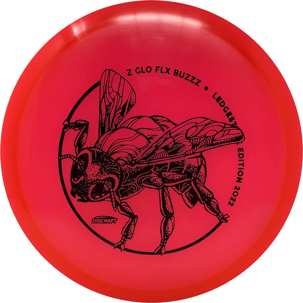 Discraft Z FLX Color Glo Buzzz 2022 Ledgestone glowing midrange suitable for precise throws.