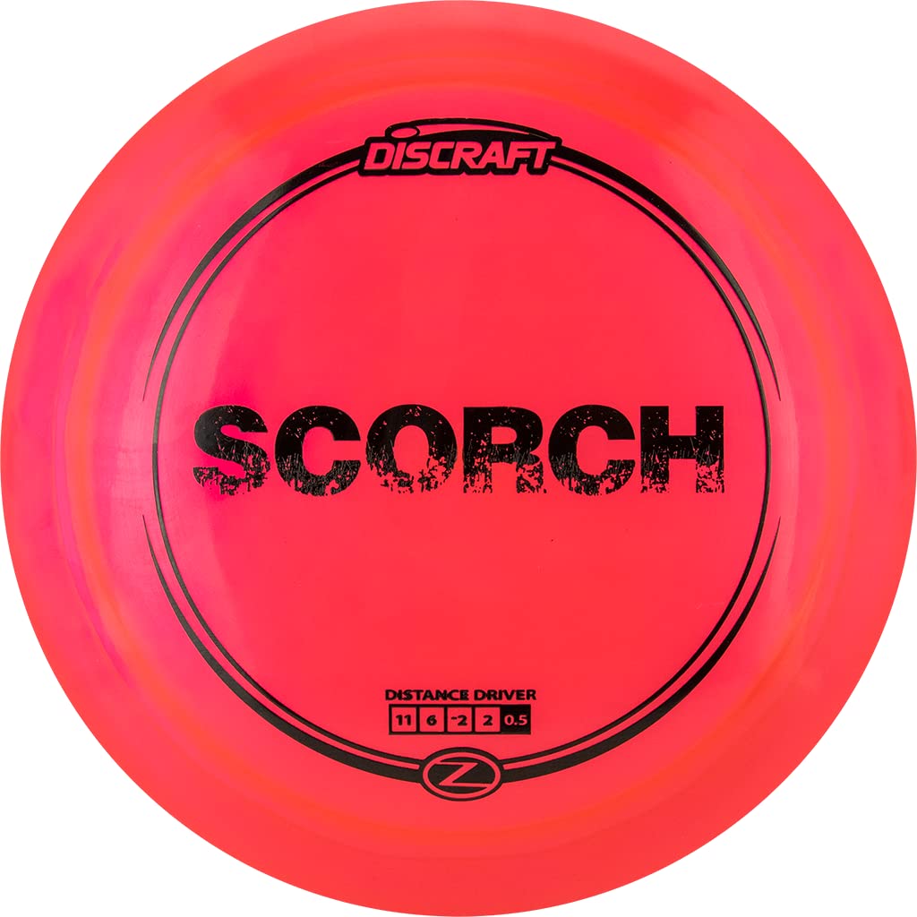 Discraft Z Scorch disc in flight showing high glide and controlled fade for distance