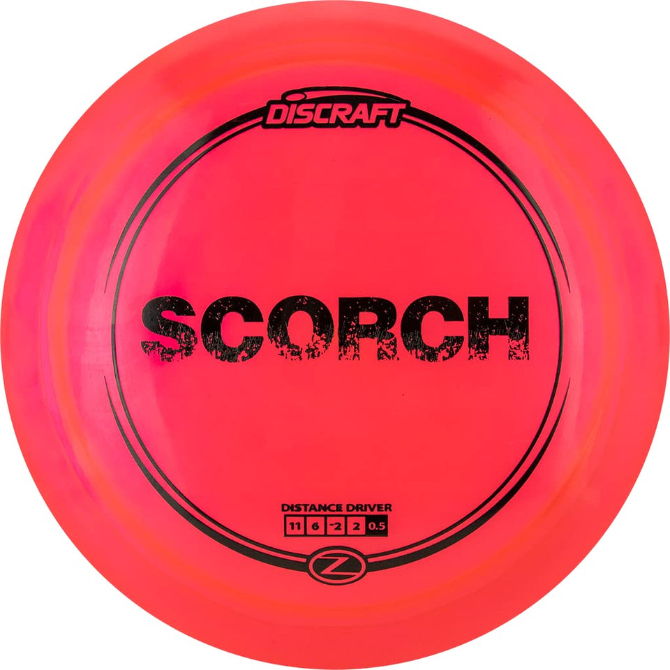 Discraft Z Scorch disc in flight showing high glide and controlled fade for distance