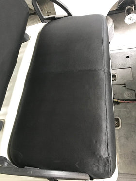 Dr.Acces golf cart seat cover being easily installed on an EZGO TXT bench seat.