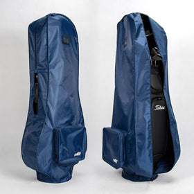 Navy rain cover compactly folded for easy transport.