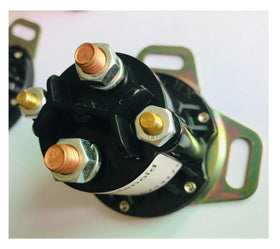 Close-up of four-terminal connectors on Dr.Acces EZGO RXV solenoid for solid connections.