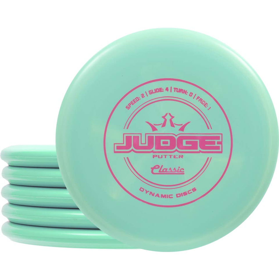Dynamic Discs Classic Judge 3-putters on green for practice putting consistency
