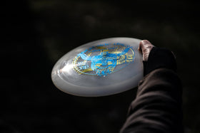 Dynamic Discs Classic plastic closeup, stiff feel aiding consistent releases.