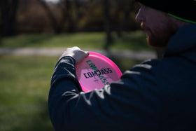 Dynamic Discs Prime plastic closeup, excellent grip in varying weather.
