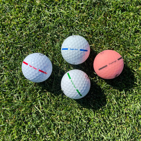 Fairway Golf Par Tour ball resting on green highlighting visibility for approach shots.