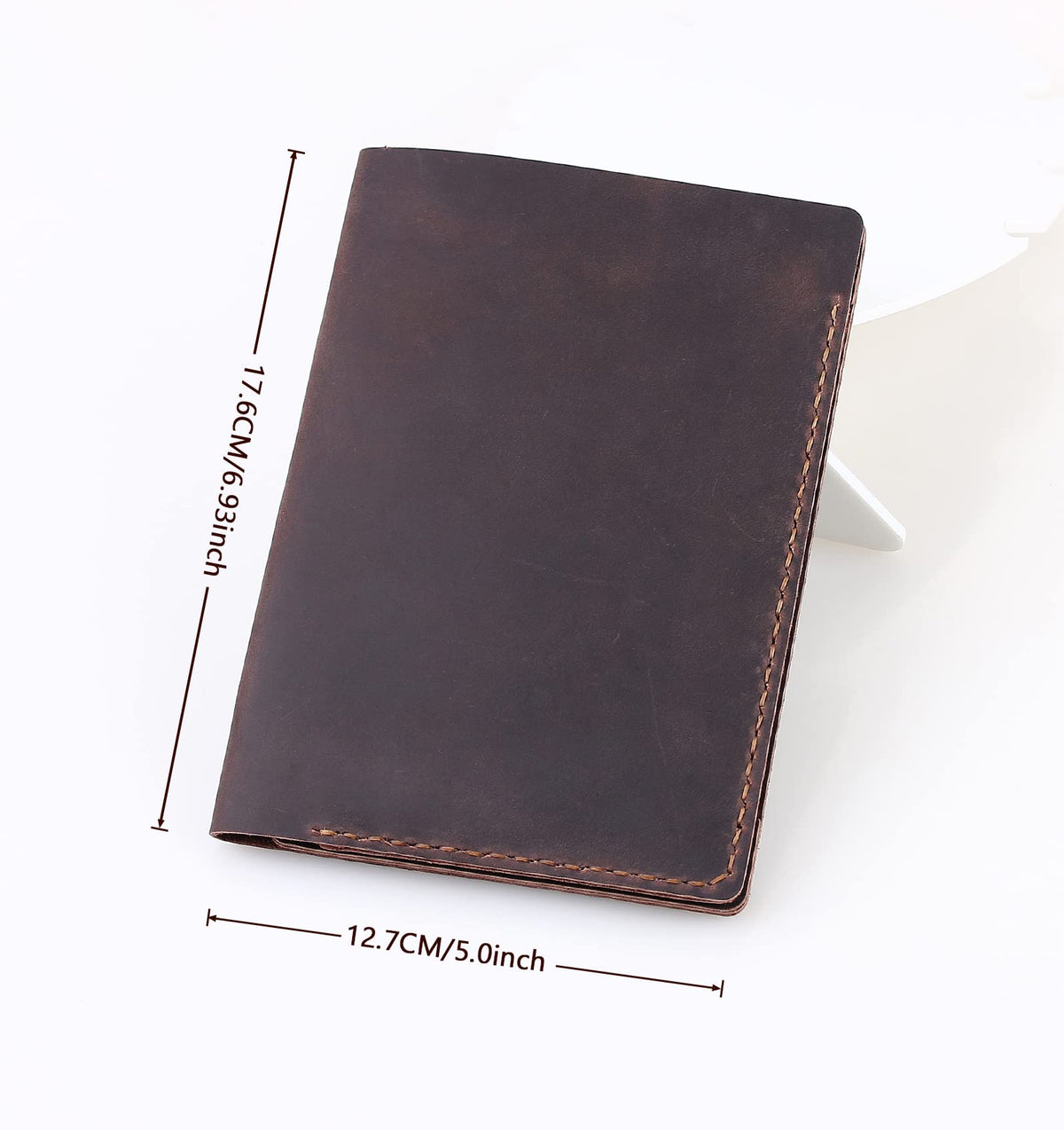 Fasjosma yardage book cover in coffee leather protects notes during play