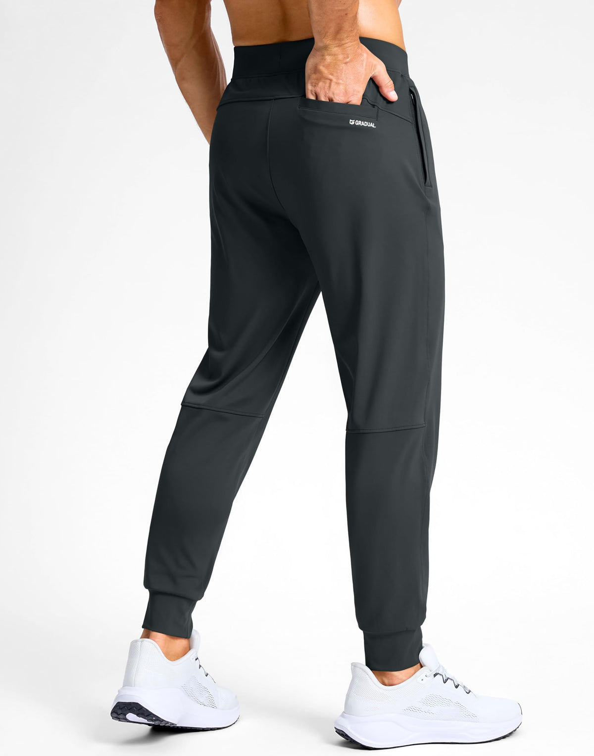 G Gradual back pocket detail for extra stowage while active