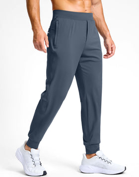 G Gradual dusty blue joggers showing zip pockets for secure valuables during workouts.