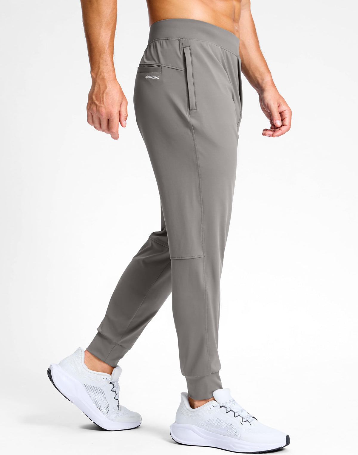 G Gradual joggers with zip pockets, deep storage for essentials during workouts.