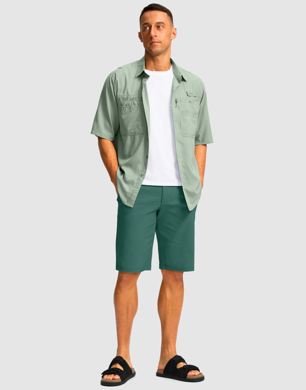 G Gradual on-course lifestyle shot suggests performance-ready shorts for golf and outdoor activities.