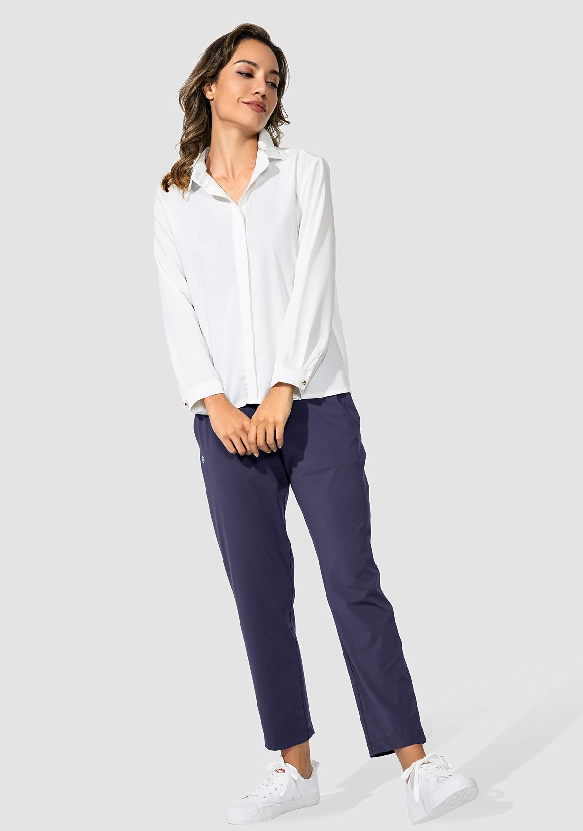 G Gradual navy 7/8 pants suited for golf, travel, and casual wear.