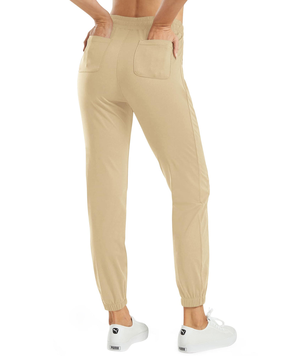 G4Free Women's tapered golf pants with side pockets for secure on-course essentials.