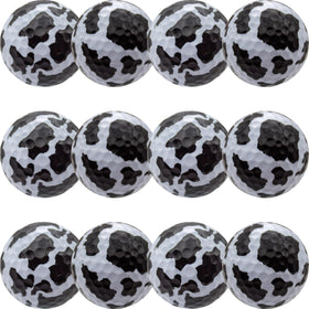 GBM cow print novelty golf ball with 360-wrap design for high visibility on the course