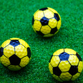 GBM yellow soccer golf ball packaging display emphasizes giftable novelty for clubs