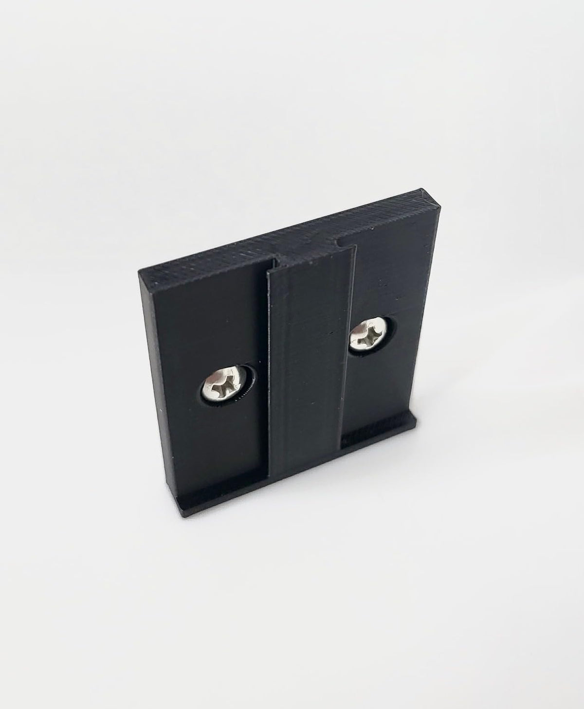 Generic 3D-printed PETG mount bracket demonstrates durable construction.