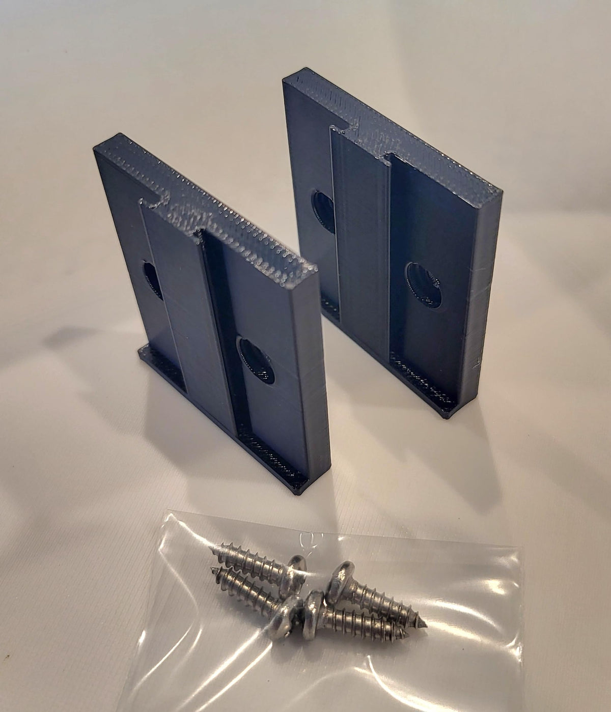 Generic LiftMaster remote mount with screws for fast setup.