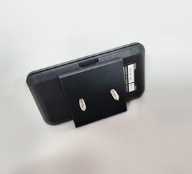 Generic low-profile mount design blends with vehicle interior.