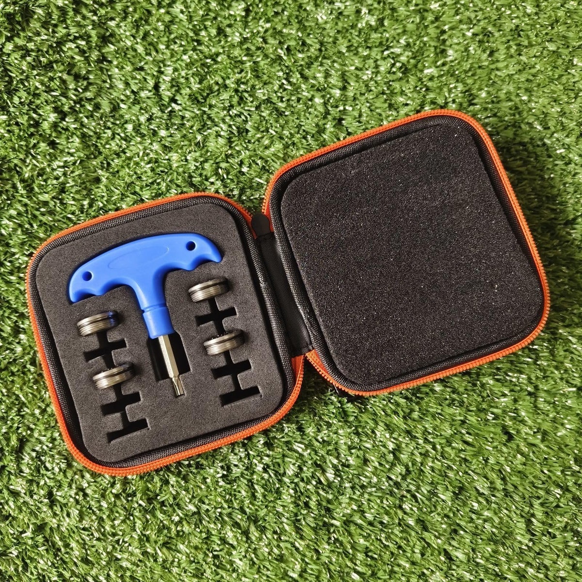 Two 25g and two 30g weights laid out for flexible tuning