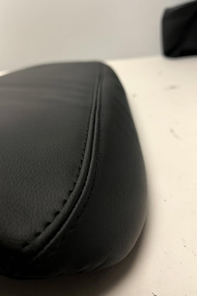 Armrest cover installed in Chevy Corvette C6 interior