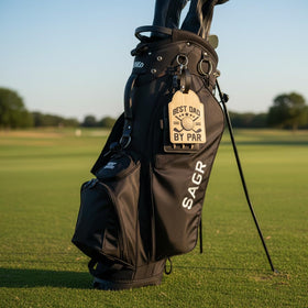 Generic Best Dad By Par golf bag accessory makes a thoughtful gift for golf lovers.