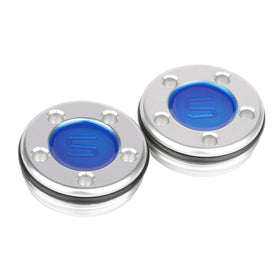 Close-up of 5g and 10g weights for tuning putter balance.