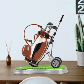 Generic cake-topper-golf-pen-holder doubles as a novelty gift for golf fans.