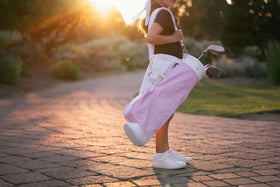 Generic children's golf bag pink shoulder strap, adjustable for growing players.