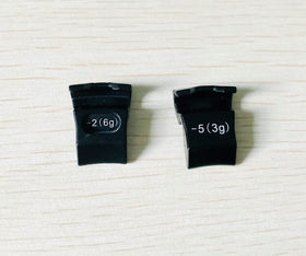 Generic Dree ambidextrous screw pack with black finish for quick weight adjustments.