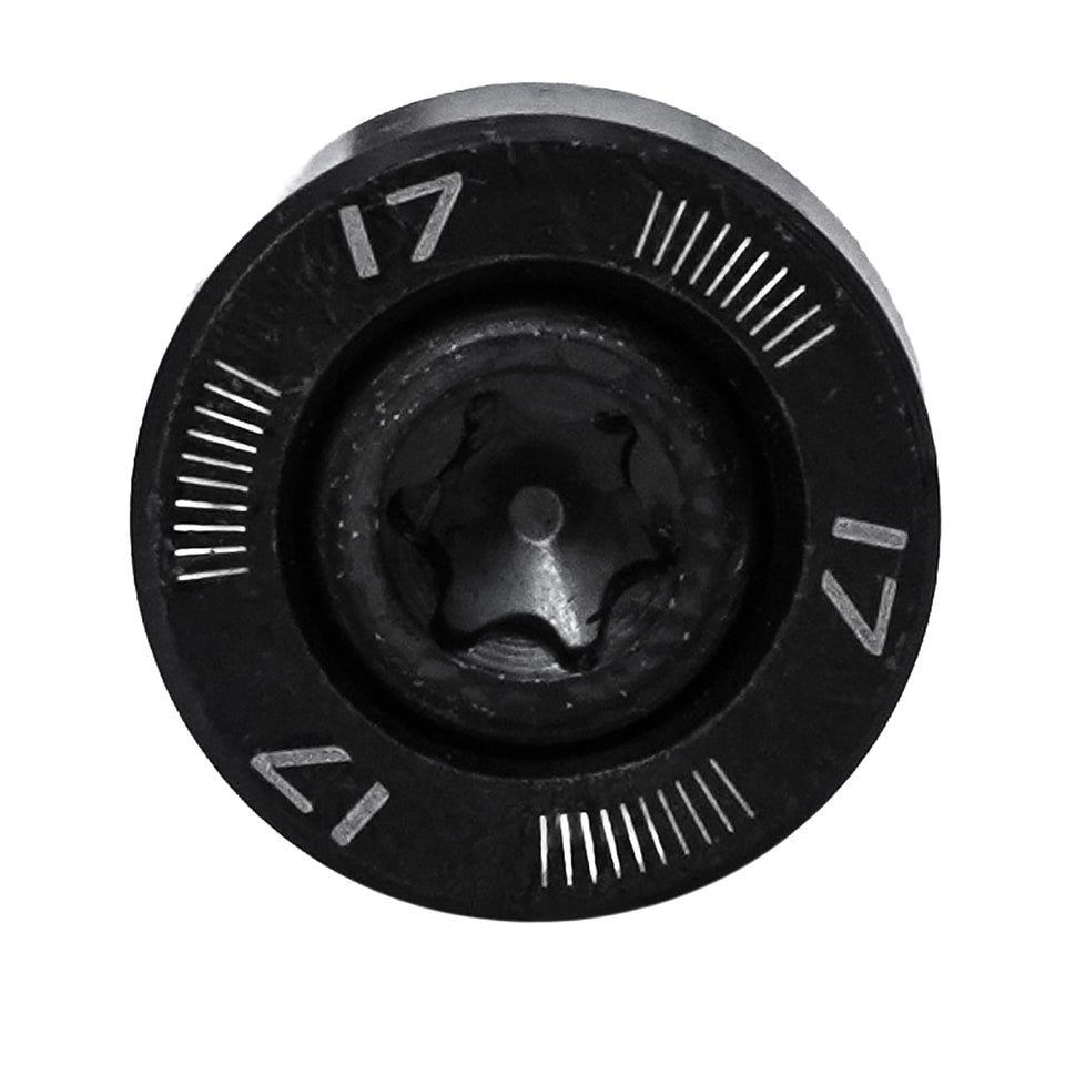 Generic Qi35 17g golf weight attached to driver for tuning and precision.