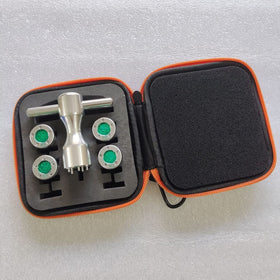 Close-up of 25g and 30g weights with protective O-rings for moisture protection.