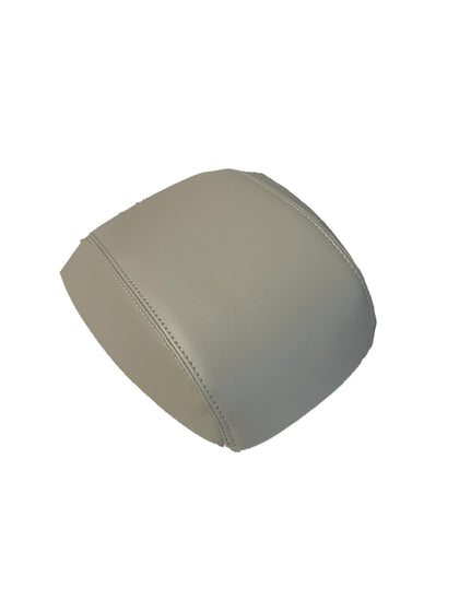 Generic Ivory Tan Leather center console armrest cover close-up stitching for durability and style.